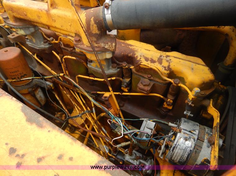 image for item G3235 John Deere elevating scraper