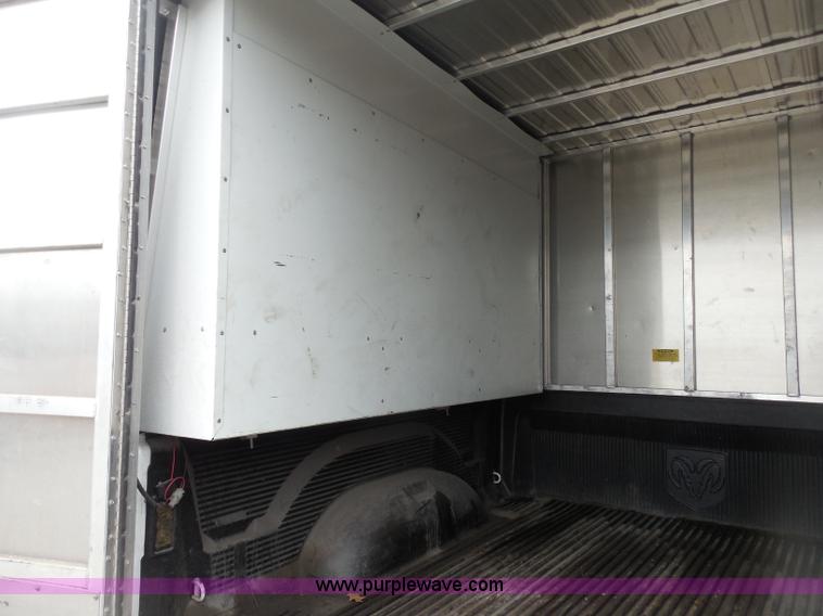 image for item I1000 2008 Dodge Ram 1500 Quad Cab pickup truck