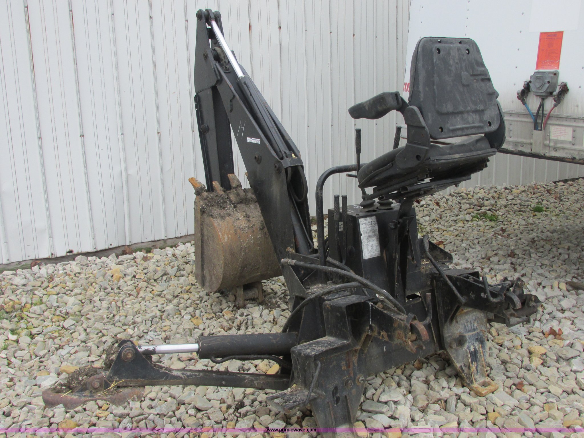 Ford New Holland B124 skid steer backhoe attachment in Oglesby, IL