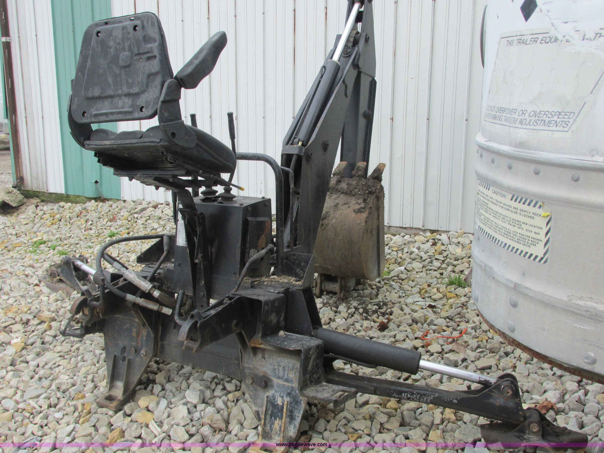 Ford New Holland B124 skid steer backhoe attachment in Oglesby, IL