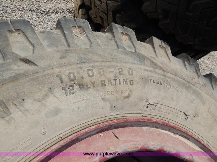 image for item AA9323 (7) 10.00-20 tires and wheels