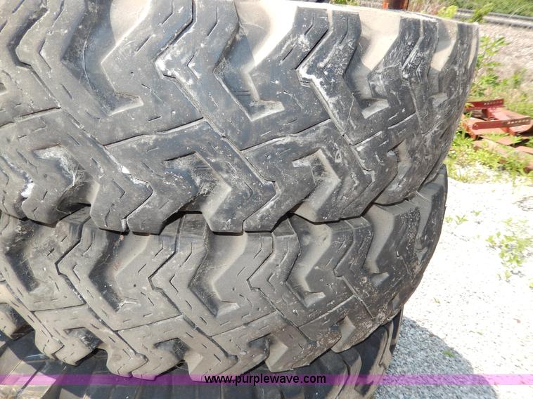 image for item AA9323 (7) 10.00-20 tires and wheels