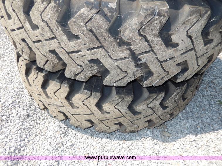 image for item AA9323 (7) 10.00-20 tires and wheels