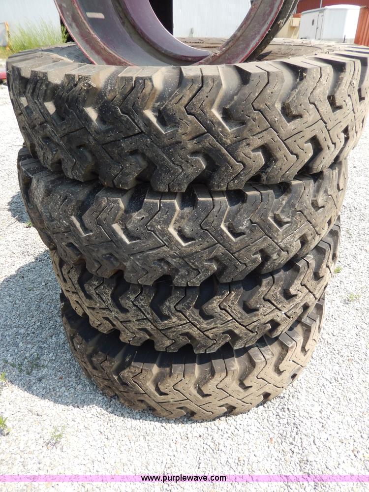 image for item AA9323 (7) 10.00-20 tires and wheels