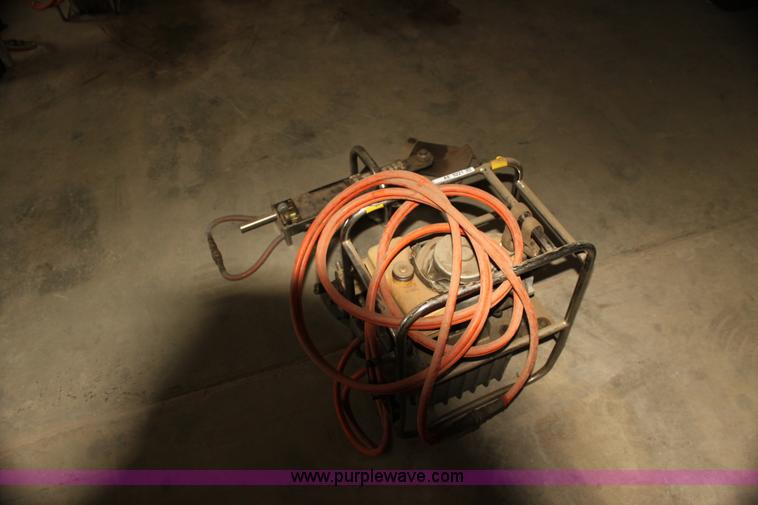 image for item AE9221 Cutter with pump and hose