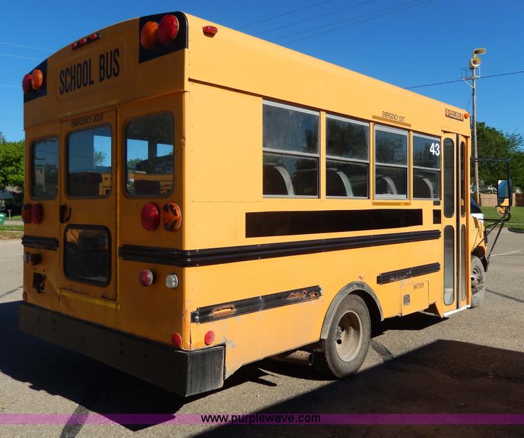 image for item D8090 1999 Ford Collins school bus