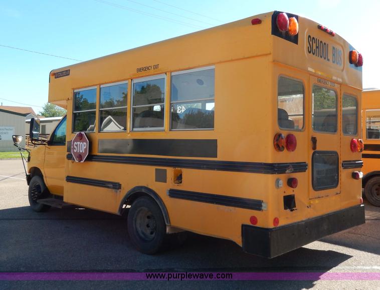 image for item D8090 1999 Ford Collins school bus