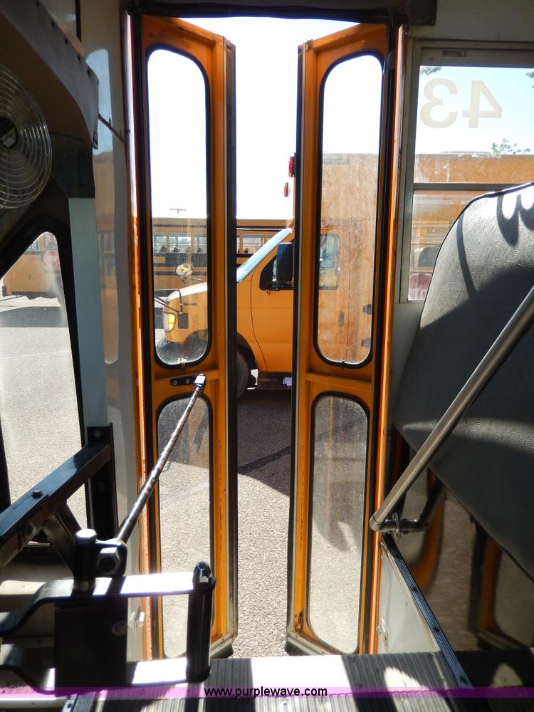 image for item D8090 1999 Ford Collins school bus