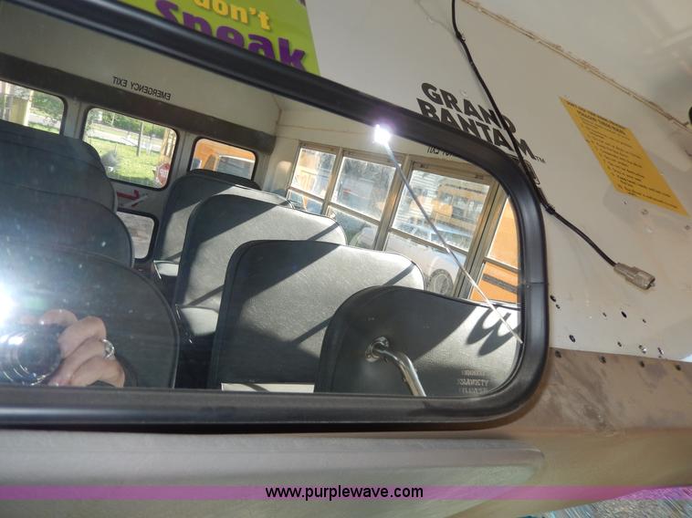 image for item D8090 1999 Ford Collins school bus