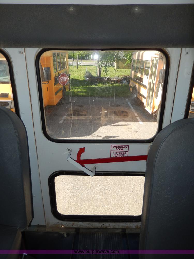 image for item D8090 1999 Ford Collins school bus