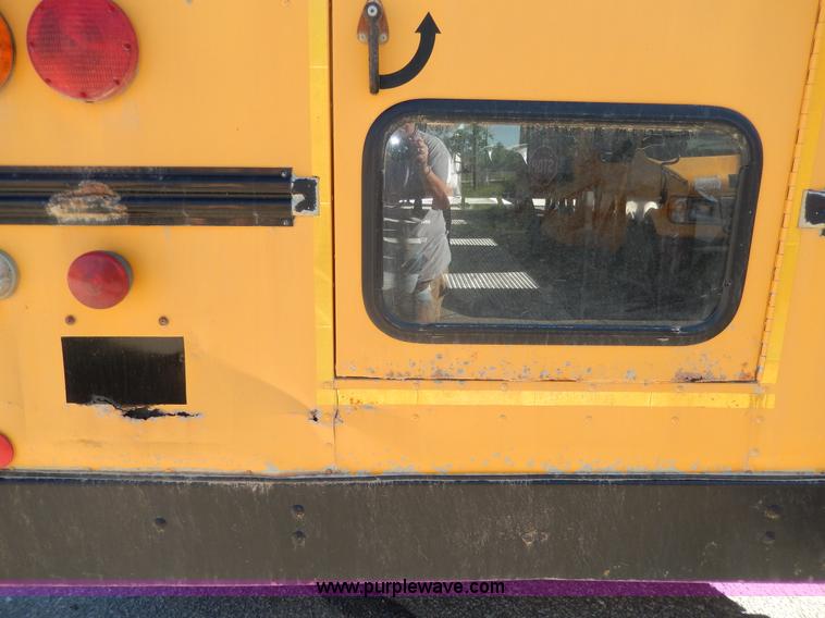 image for item D8090 1999 Ford Collins school bus