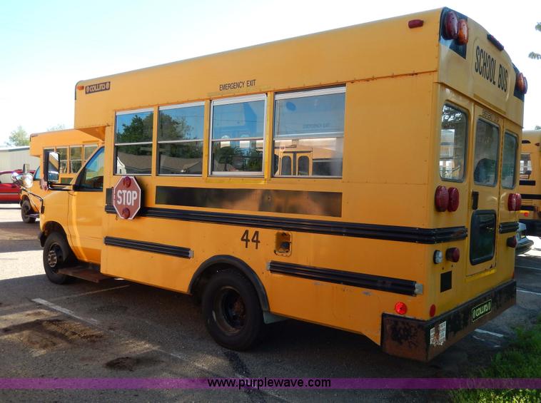 image for item D8091 1999 Ford Collins school bus
