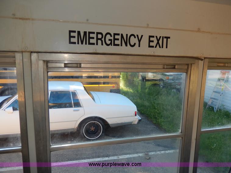 image for item D8091 1999 Ford Collins school bus