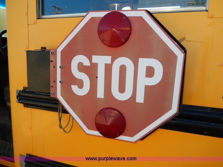 image for item D8091 1999 Ford Collins school bus