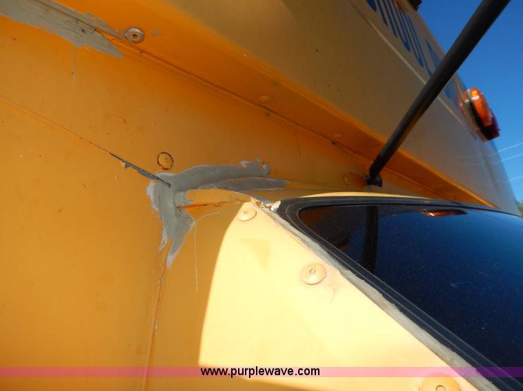 image for item D8091 1999 Ford Collins school bus