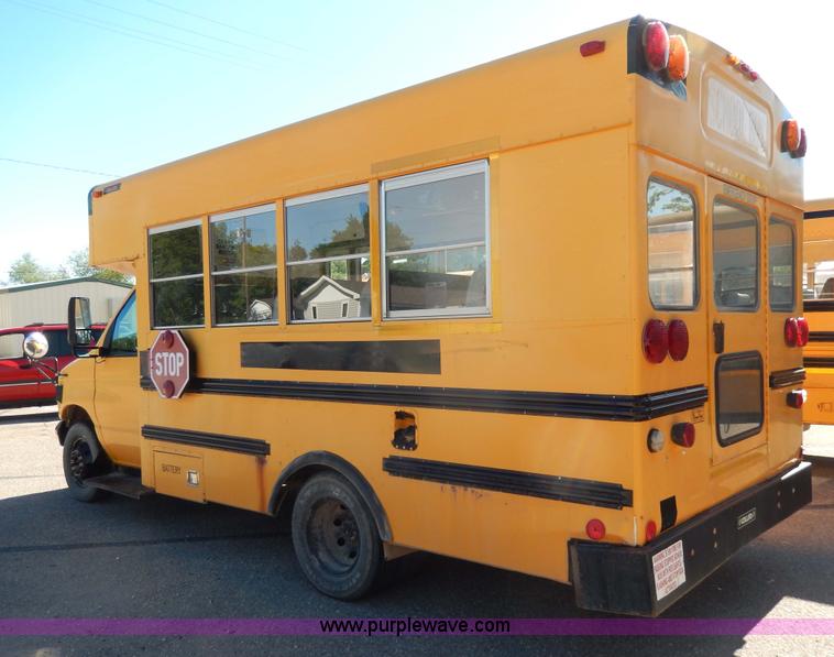image for item D8092 1998 Ford Collins school bus