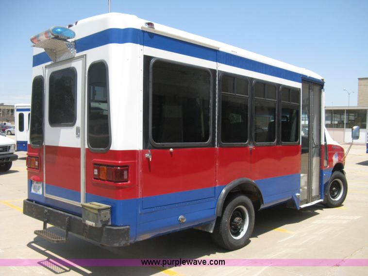 image for item D8365 1994 Ford E350 Collins transit bus