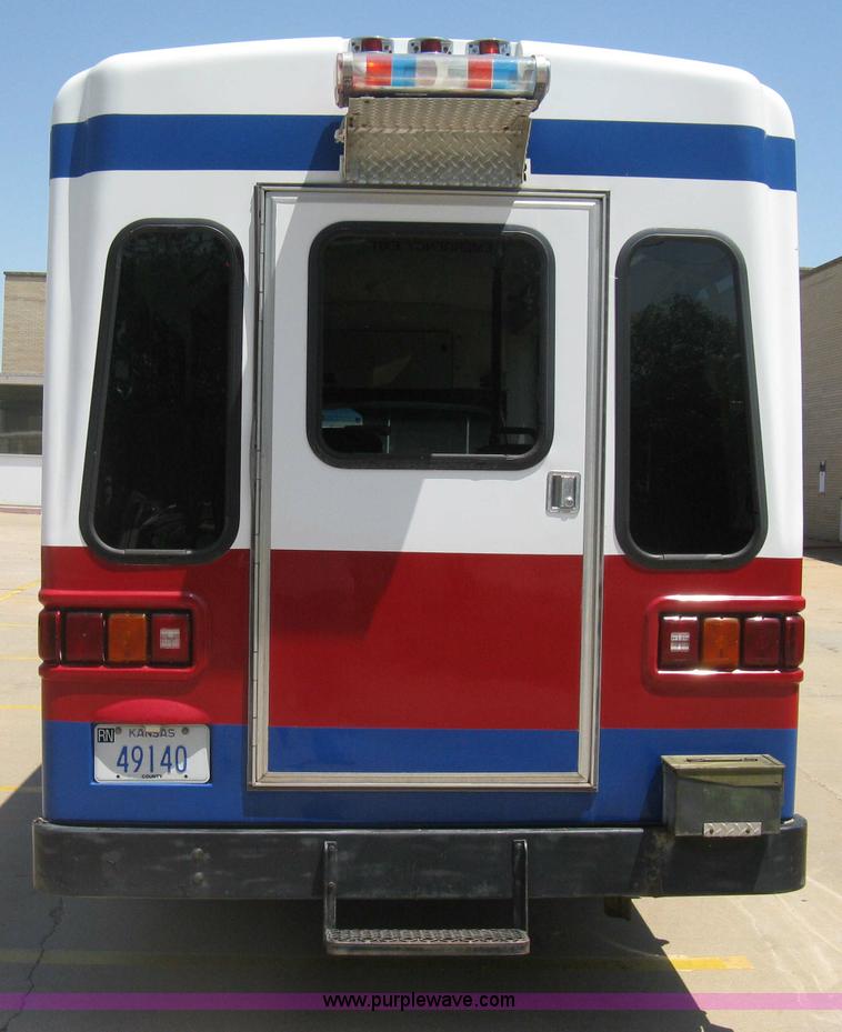 image for item D8365 1994 Ford E350 Collins transit bus