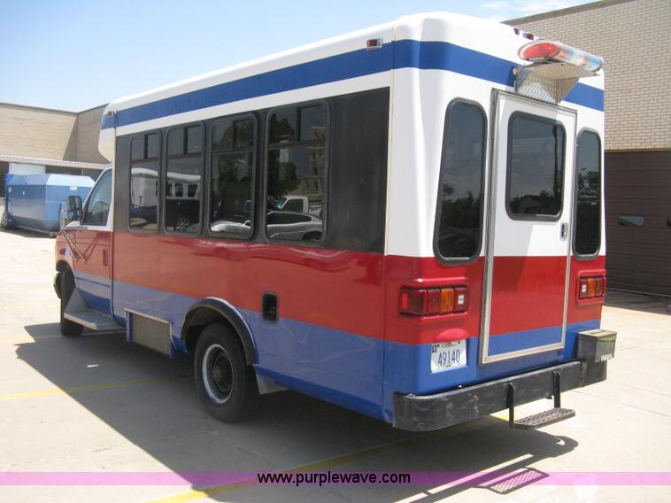 image for item D8365 1994 Ford E350 Collins transit bus