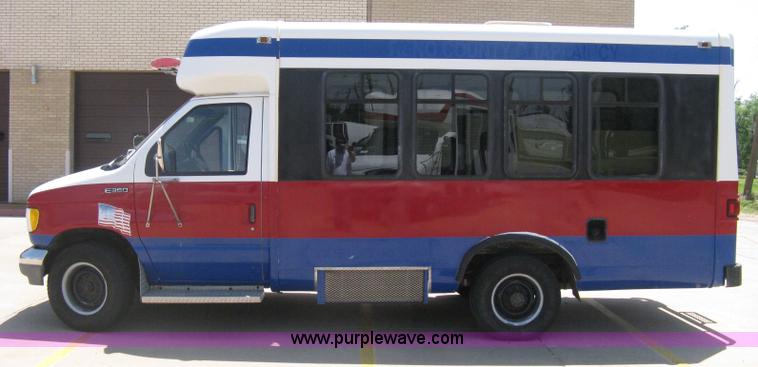 image for item D8365 1994 Ford E350 Collins transit bus