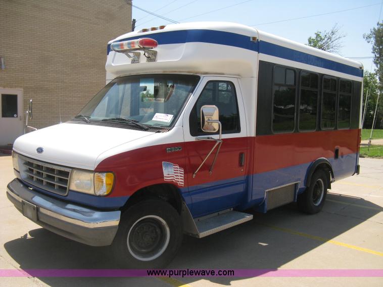 image for item D8365 1994 Ford E350 Collins transit bus