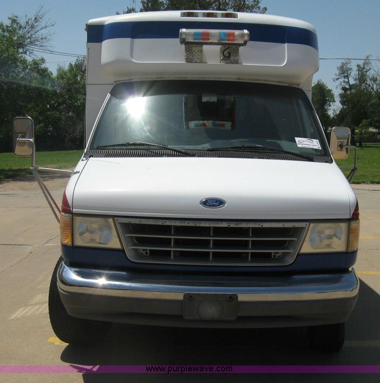 image for item D8365 1994 Ford E350 Collins transit bus