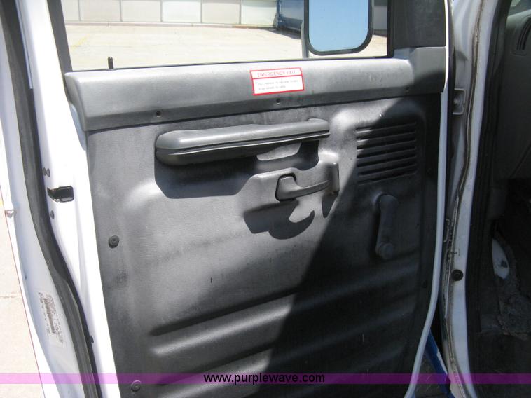 image for item D8365 1994 Ford E350 Collins transit bus