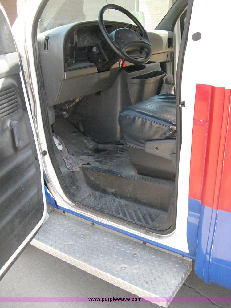 image for item D8365 1994 Ford E350 Collins transit bus