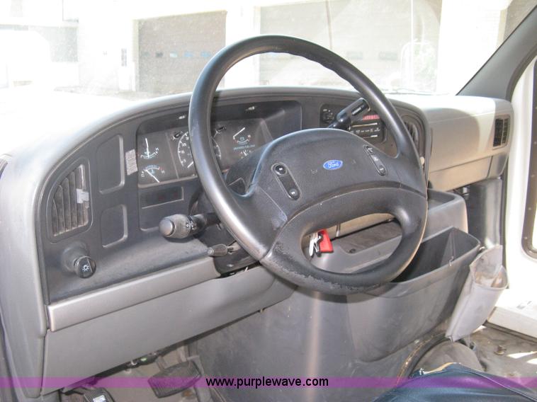 image for item D8365 1994 Ford E350 Collins transit bus