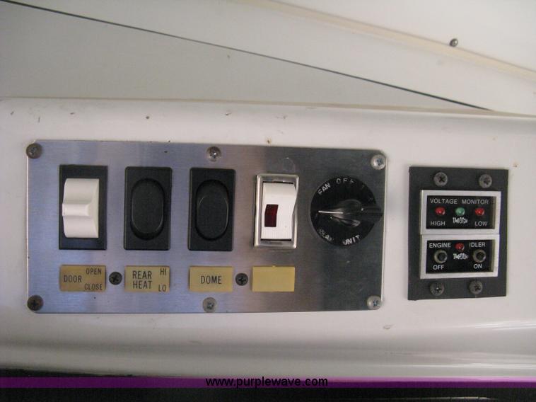 image for item D8365 1994 Ford E350 Collins transit bus