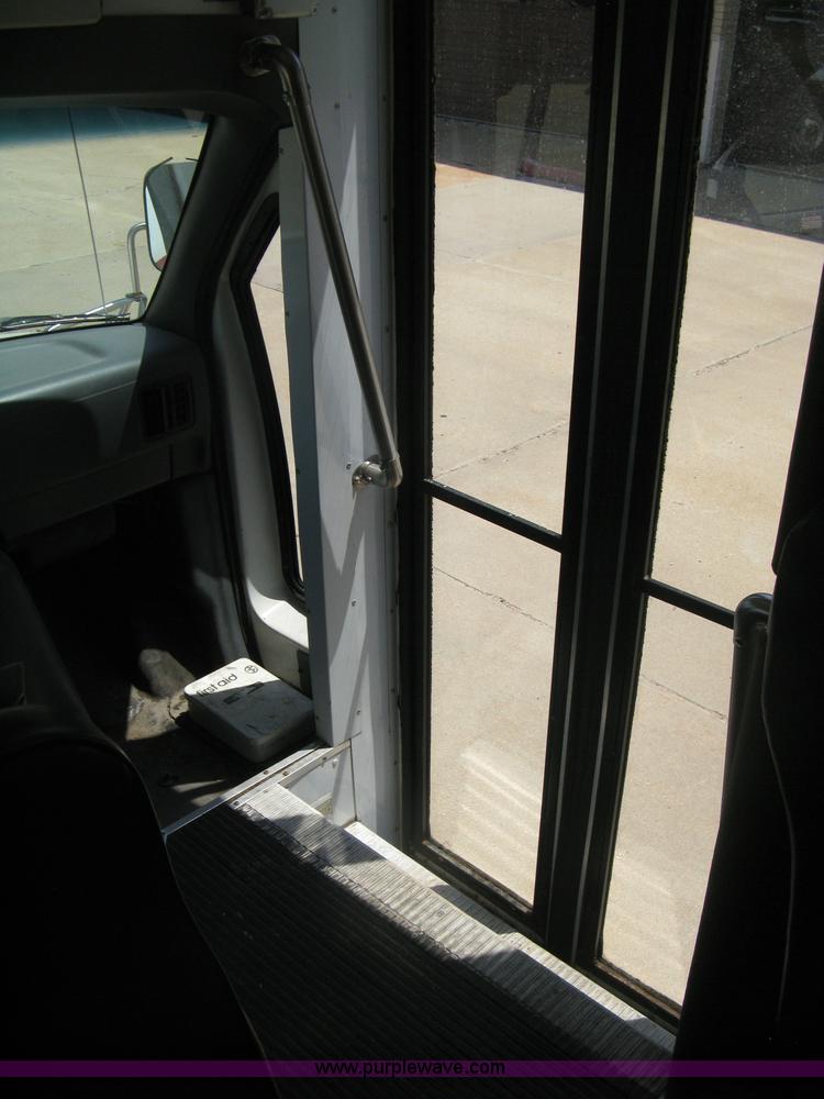 image for item D8365 1994 Ford E350 Collins transit bus