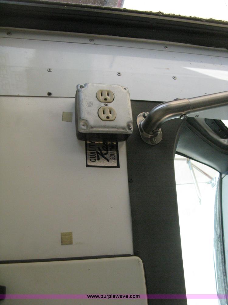 image for item D8365 1994 Ford E350 Collins transit bus