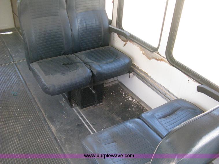 image for item D8365 1994 Ford E350 Collins transit bus