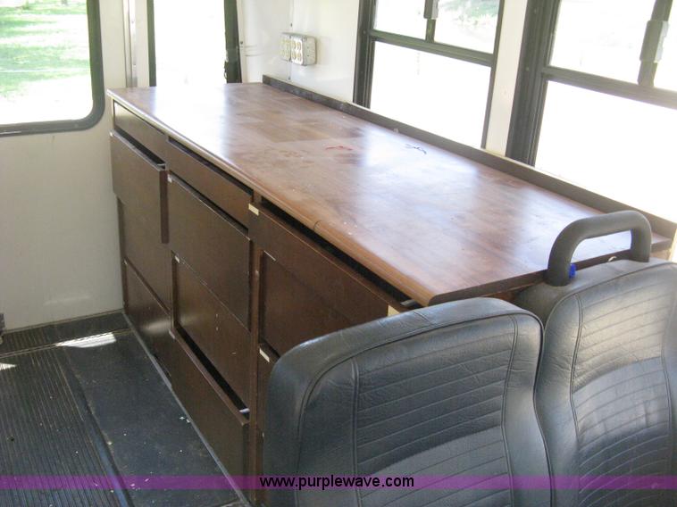 image for item D8365 1994 Ford E350 Collins transit bus