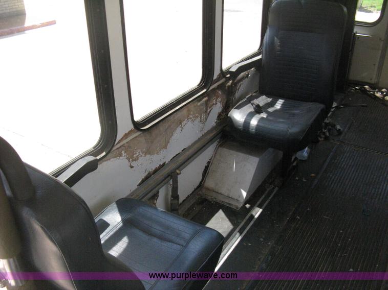 image for item D8365 1994 Ford E350 Collins transit bus