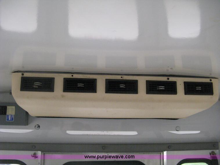 image for item D8365 1994 Ford E350 Collins transit bus