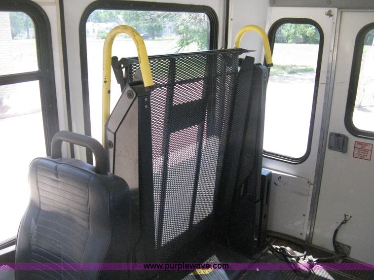 image for item D8365 1994 Ford E350 Collins transit bus