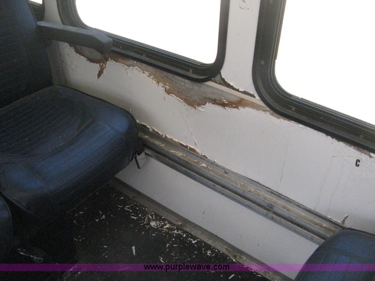 image for item D8365 1994 Ford E350 Collins transit bus