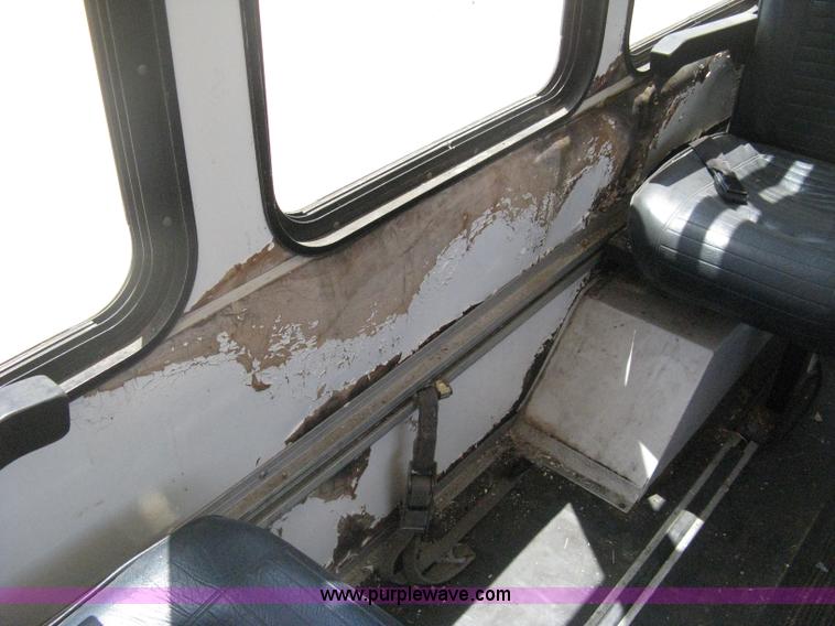 image for item D8365 1994 Ford E350 Collins transit bus