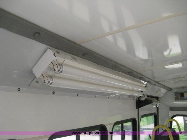 image for item D8365 1994 Ford E350 Collins transit bus