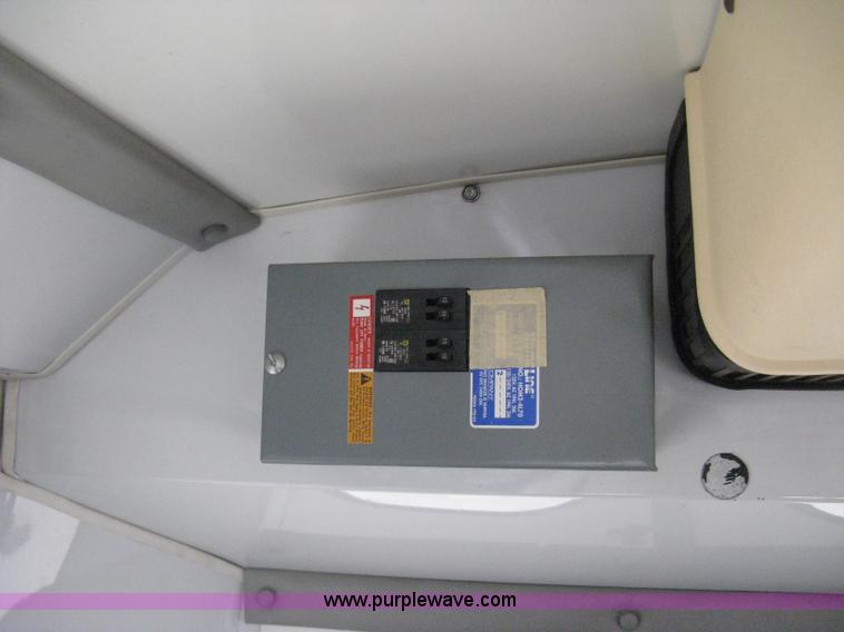 image for item D8365 1994 Ford E350 Collins transit bus