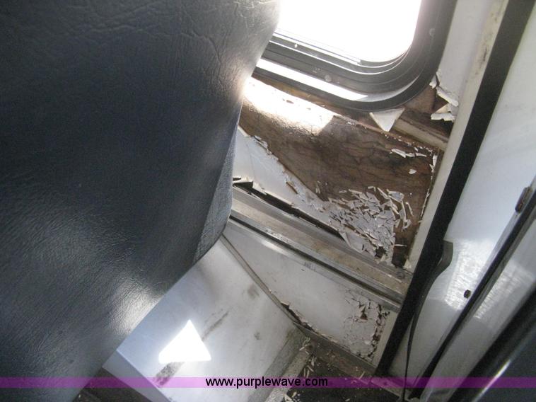 image for item D8365 1994 Ford E350 Collins transit bus