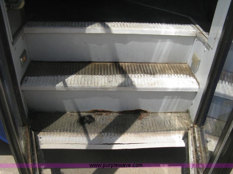 image for item D8365 1994 Ford E350 Collins transit bus