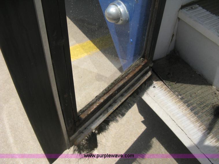 image for item D8365 1994 Ford E350 Collins transit bus