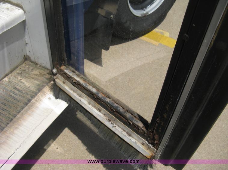 image for item D8365 1994 Ford E350 Collins transit bus