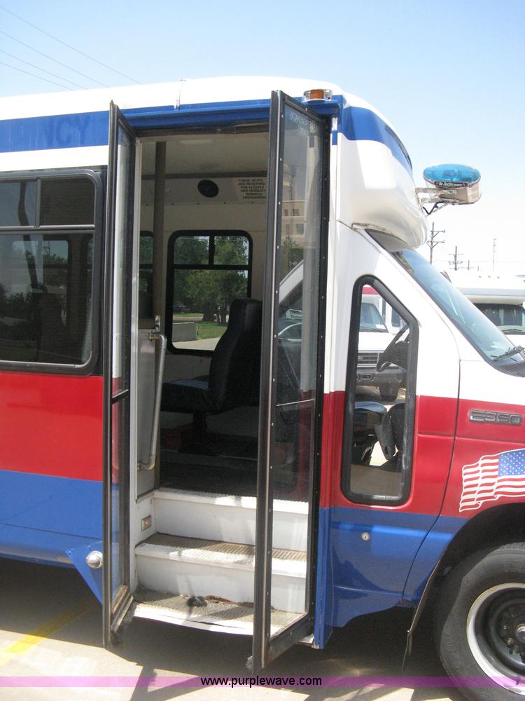 image for item D8365 1994 Ford E350 Collins transit bus