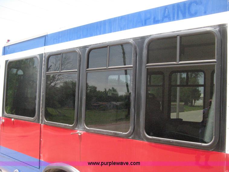 image for item D8365 1994 Ford E350 Collins transit bus