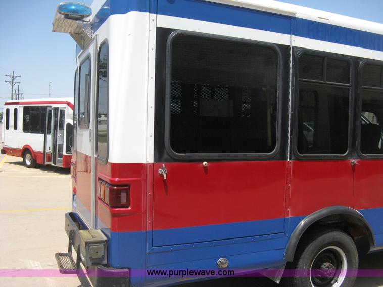 image for item D8365 1994 Ford E350 Collins transit bus