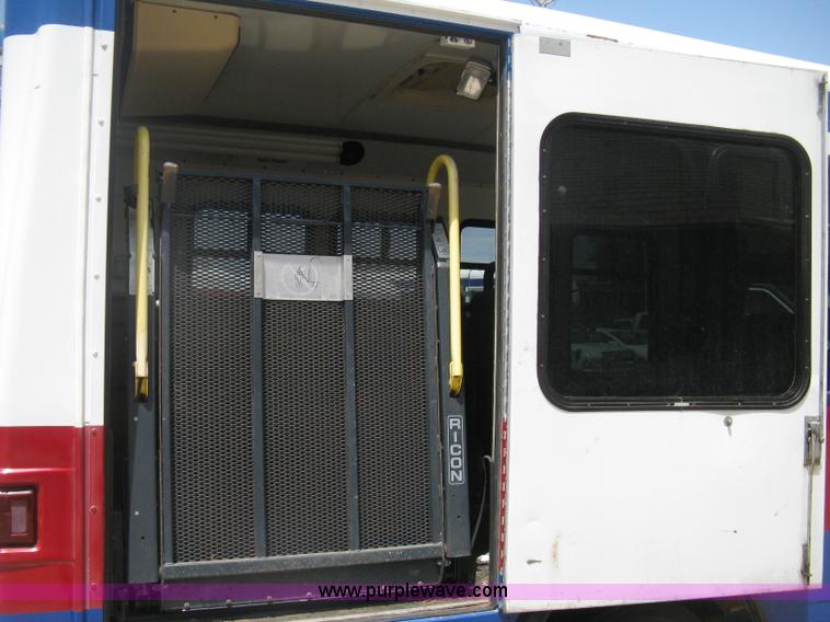 image for item D8365 1994 Ford E350 Collins transit bus