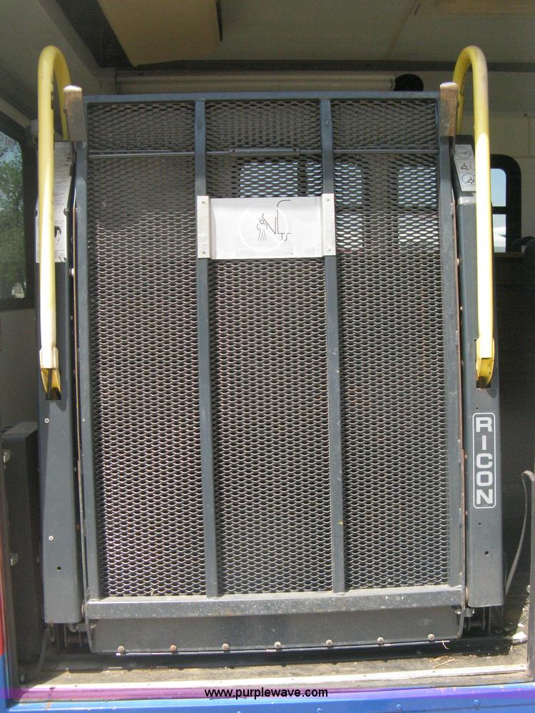 image for item D8365 1994 Ford E350 Collins transit bus